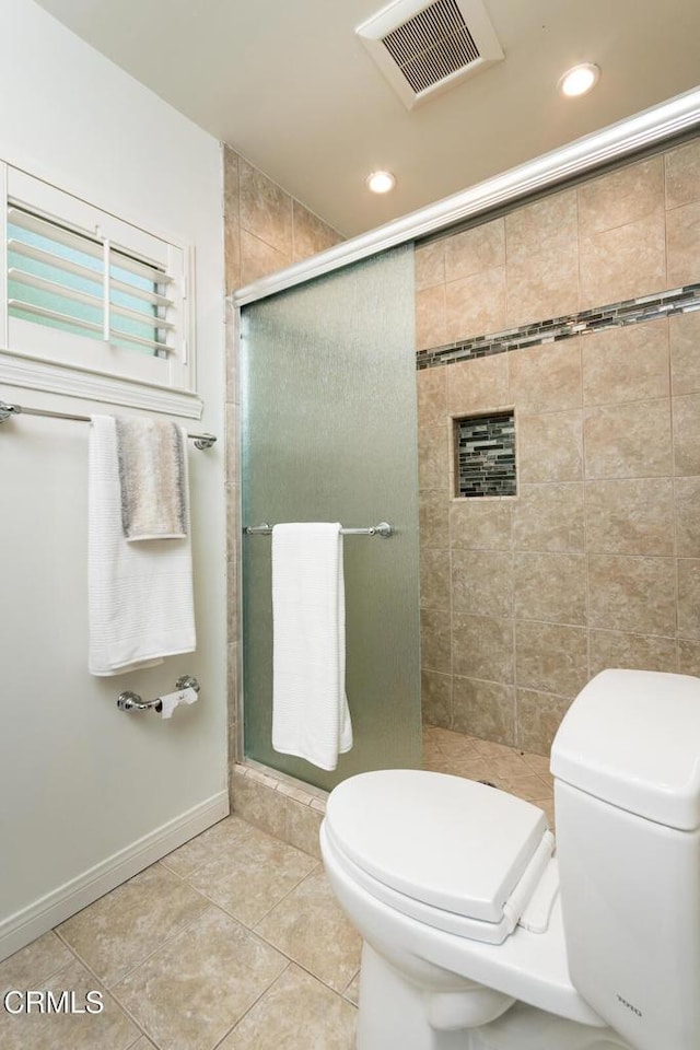 10503 Jimenez St, Sylmar, CA 91342 - full bath featuring toilet, a shower stall, tile patterned floors, recessed lighting, and baseboards