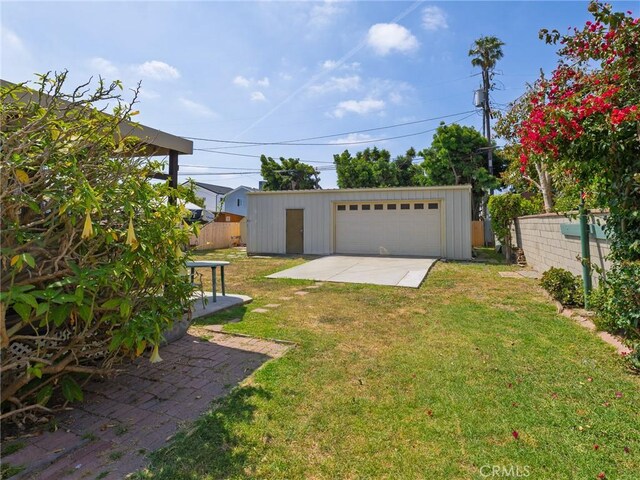 5526 W 118th Pl, Hawthorne, CA 90304 - view of yard with a garage, an outbuilding, and a patio