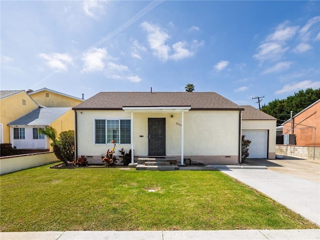 5526 W 118th Pl, Hawthorne, CA 90304 - view of front of house with concrete driveway, an attached garage, a front lawn, and stucco siding