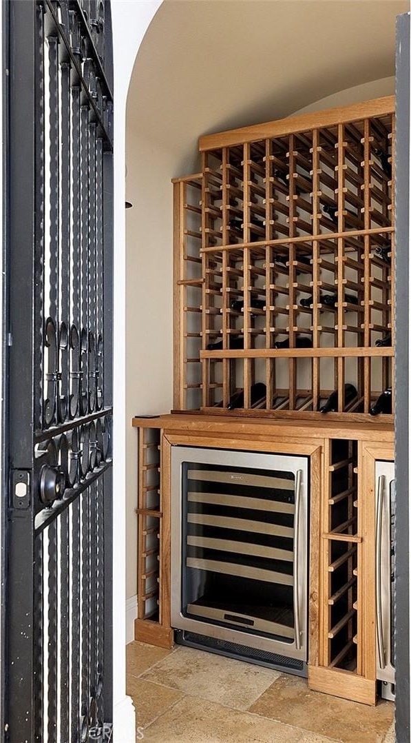 47 Via Alcamo, San Clemente, CA 92673 - wine area featuring wine cooler and arched walkways