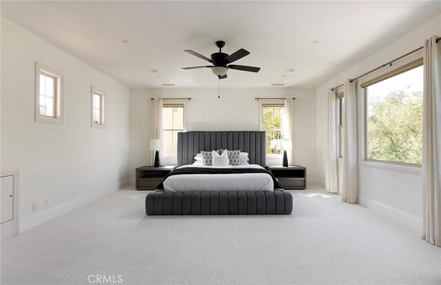 47 Via Alcamo, San Clemente, CA 92673 - carpeted bedroom with multiple windows, ceiling fan, and baseboards