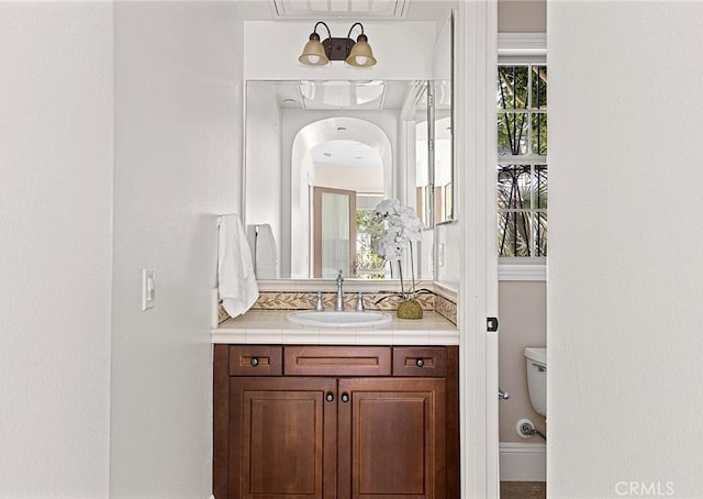 47 Via Alcamo, San Clemente, CA 92673 - bathroom with vanity, toilet, and healthy amount of natural light