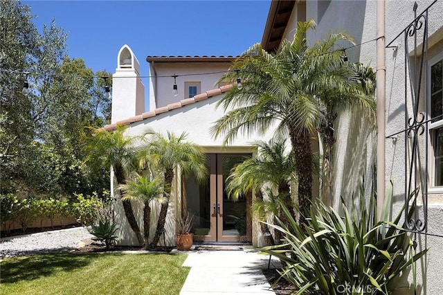 47 Via Alcamo, San Clemente, CA 92673 - entrance to property with french doors, stucco siding, and a tile roof