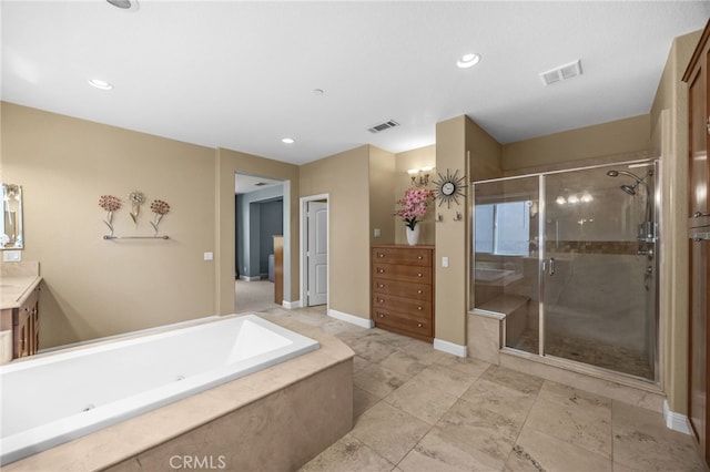 4267 Carnegie Ct, Riverside, CA 92505 - full bathroom featuring vanity, a whirlpool tub, a stall shower, and recessed lighting
