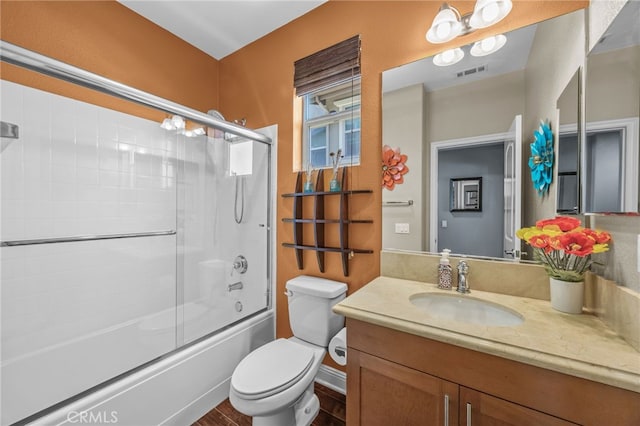 4267 Carnegie Ct, Riverside, CA 92505 - full bathroom featuring vanity, combined bath / shower with glass door, and wood finished floors
