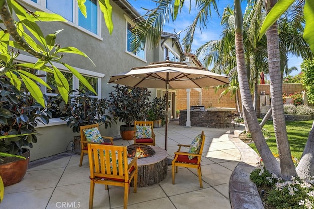 4267 Carnegie Ct, Riverside, CA 92505 - view of patio / terrace with a fire pit