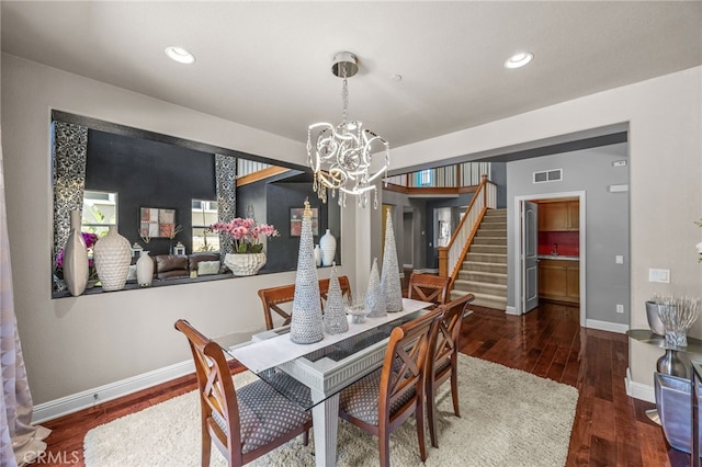 4267 Carnegie Ct, Riverside, CA 92505 - dining area with a chandelier, stairway, hardwood / wood-style flooring, and recessed lighting