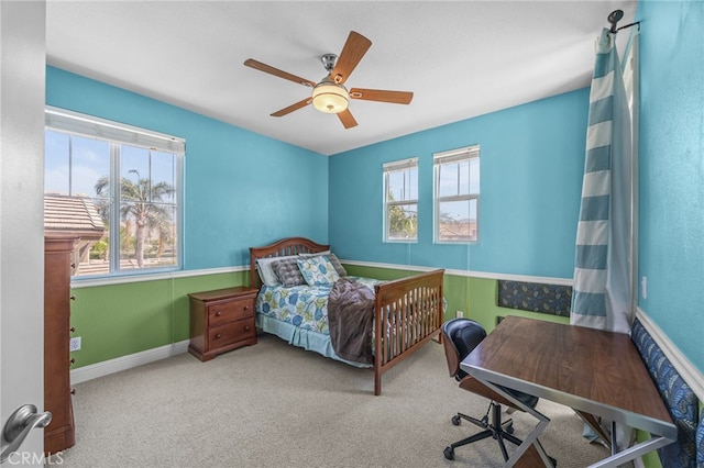 4267 Carnegie Ct, Riverside, CA 92505 - bedroom with a desk, a ceiling fan, and carpet floors