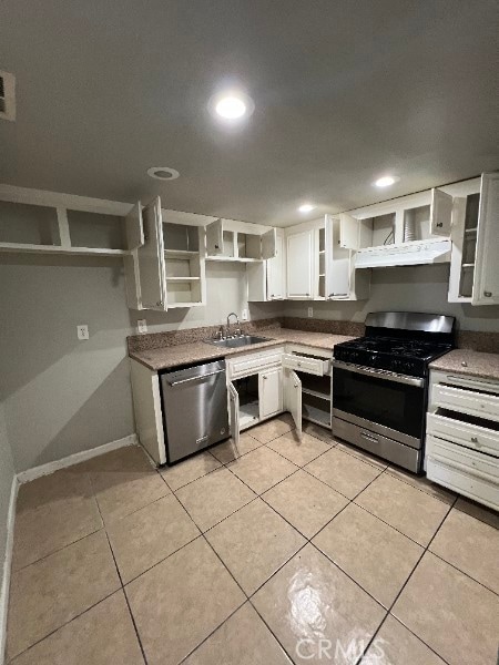 13753 Los Angeles St, Baldwin Park, CA 91706 - kitchen featuring appliances with stainless steel finishes, open shelves, under cabinet range hood, white cabinetry, and light tile patterned floors