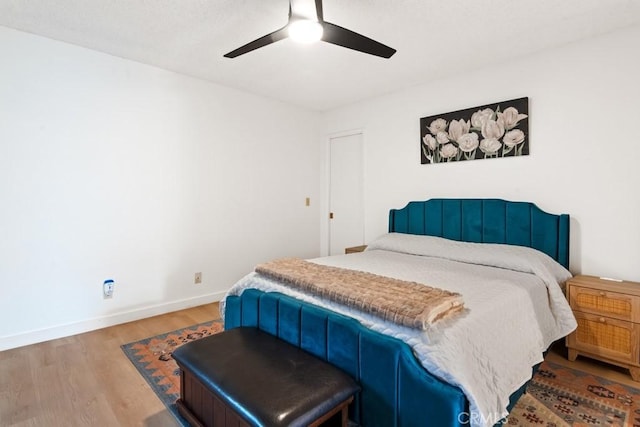 609 S Palm Ave Unit B, Hemet, CA 92543 - bedroom featuring wood finished floors and a ceiling fan