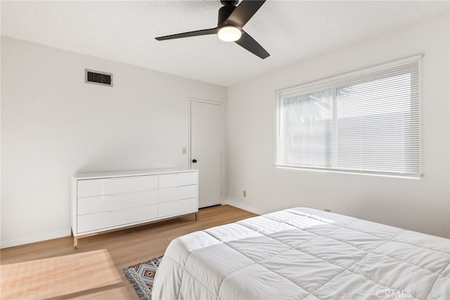 609 S Palm Ave Unit B, Hemet, CA 92543 - bedroom with wood finished floors and a ceiling fan