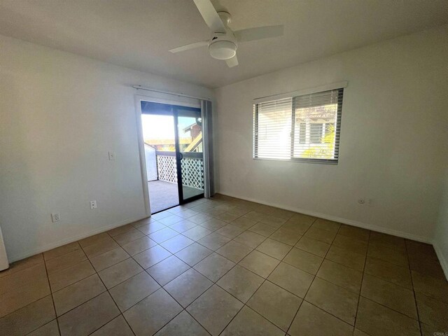 2556 Ocean Cove Dr, Cardiff By The Sea, CA 92007 - empty room with a ceiling fan and light tile patterned floors