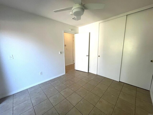 2556 Ocean Cove Dr, Cardiff By The Sea, CA 92007 - unfurnished bedroom featuring tile patterned flooring, a closet, and ceiling fan