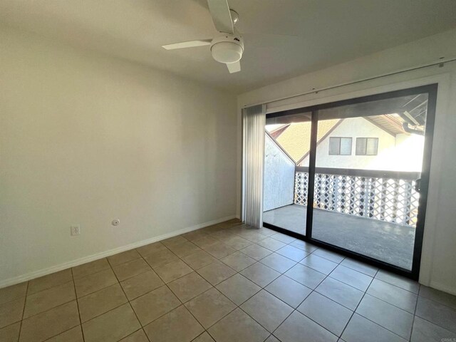 2556 Ocean Cove Dr, Cardiff By The Sea, CA 92007 - empty room with tile patterned floors and a ceiling fan