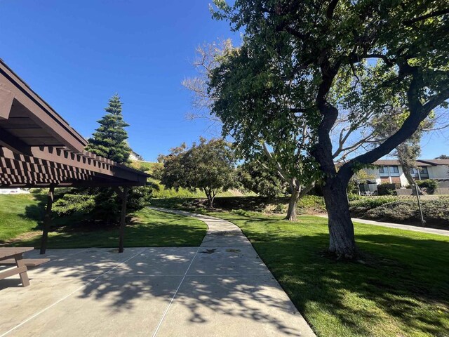 2556 Ocean Cove Dr, Cardiff By The Sea, CA 92007 - view of green lawn featuring a pergola and a patio