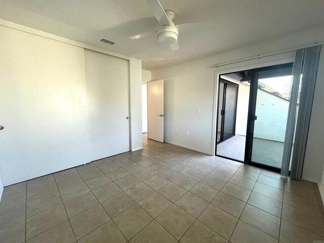 2556 Ocean Cove Dr, Cardiff By The Sea, CA 92007 - tiled spare room featuring a ceiling fan and baseboards