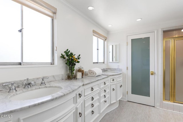 1245 S Orange Grove Blvd Unit 5, Pasadena, CA 91105 - bathroom with double vanity, a stall shower, ornamental molding, recessed lighting, and wood finished floors