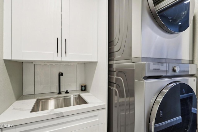 5406 Luis Dr, Agoura Hills, CA 91301 - laundry area with estacked washer and dryer and cabinet space