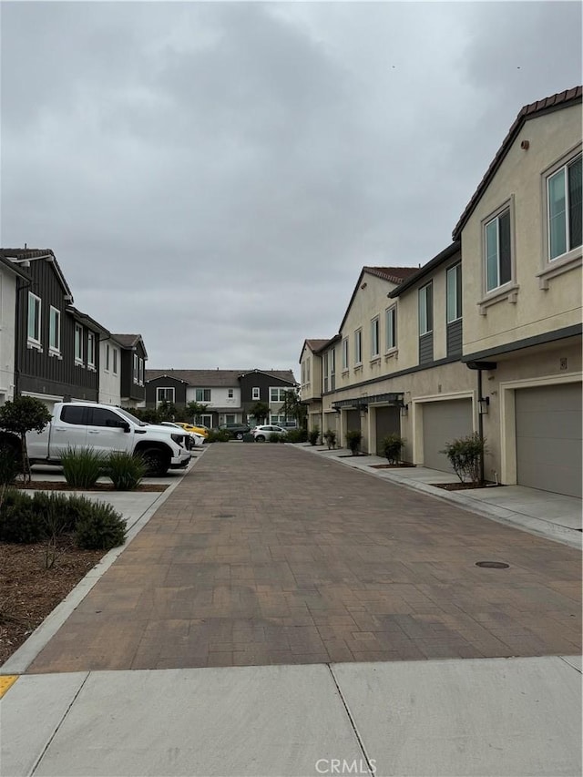 3641 E Moonlight St Unit 51, Ontario, CA 91761 - view of decorative road with a residential view