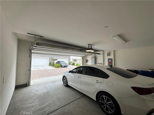 3641 E Moonlight St Unit 51, Ontario, CA 91761 - garage with a garage door opener and electric panel