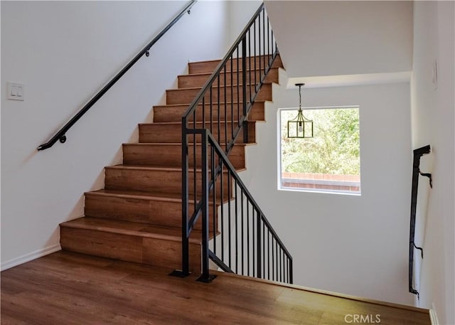 1522 N Benton Way, Los Angeles, CA 90026 - stairway featuring wood finished floors and baseboards