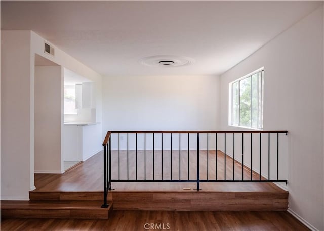 1522 N Benton Way, Los Angeles, CA 90026 - stairs featuring wood finished floors and baseboards