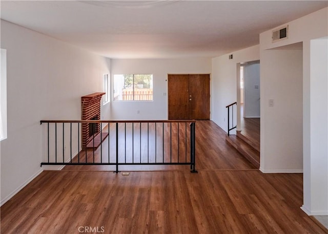 1522 N Benton Way, Los Angeles, CA 90026 - empty room featuring wood finished floors and baseboards