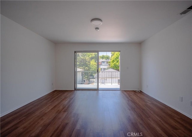 1522 N Benton Way, Los Angeles, CA 90026 - unfurnished room with dark wood-style floors and baseboards