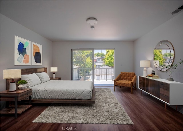 1522 N Benton Way, Los Angeles, CA 90026 - bedroom with multiple windows, access to exterior, and dark wood-style flooring