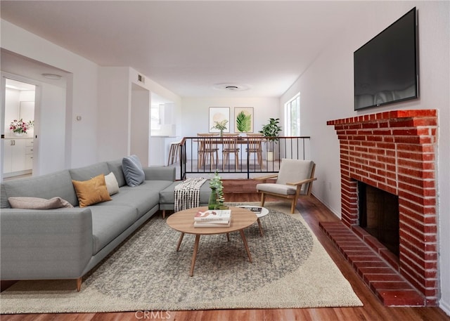 1522 N Benton Way, Los Angeles, CA 90026 - living area featuring wood finished floors and a fireplace
