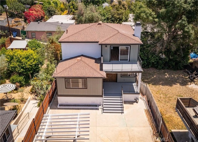 1522 N Benton Way, Los Angeles, CA 90026 - rear view of property featuring a chimney, a porch, a balcony, and a shingled roof