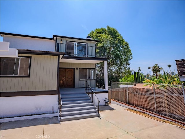 1522 N Benton Way, Los Angeles, CA 90026 - modern home with a balcony, covered porch, and crawl space