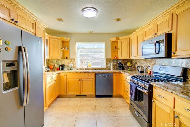 9713 Rastro Way, La Grange, CA 95329 - kitchen with stainless steel appliances, open shelves, a sink, and decorative backsplash
