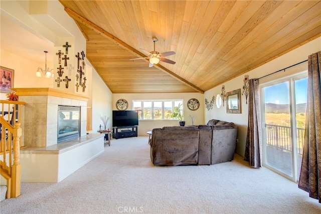 9713 Rastro Way, La Grange, CA 95329 - living area with wooden ceiling, carpet floors, vaulted ceiling, ceiling fan, and a tile fireplace