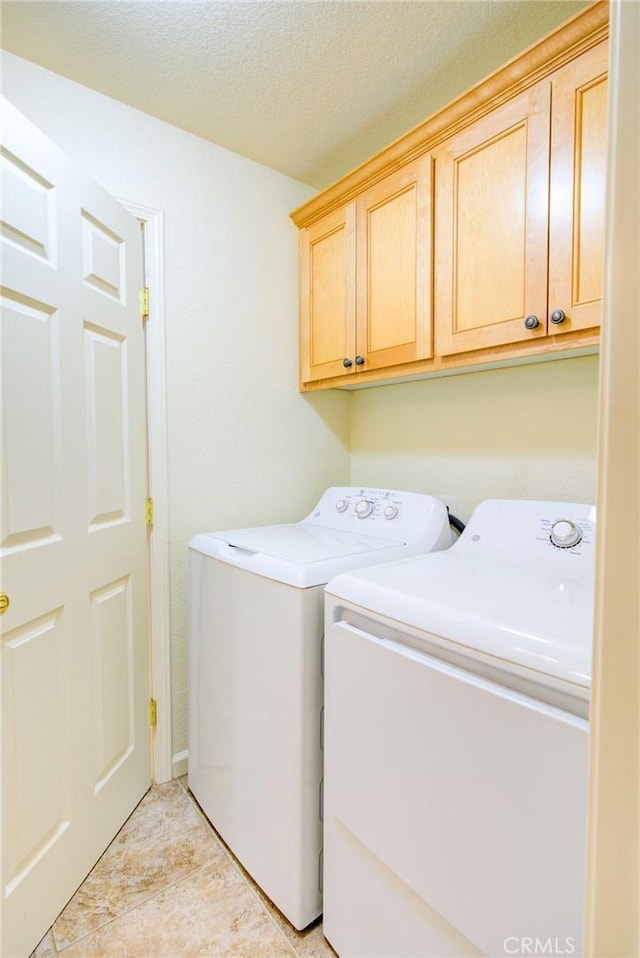 9713 Rastro Way, La Grange, CA 95329 - laundry area with cabinet space, independent washer and dryer, and a textured ceiling