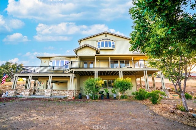 9713 Rastro Way, La Grange, CA 95329 - rear view of house with stone siding