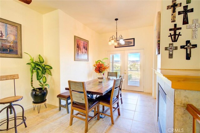 9713 Rastro Way, La Grange, CA 95329 - dining space featuring a chandelier, french doors, and light tile patterned floors