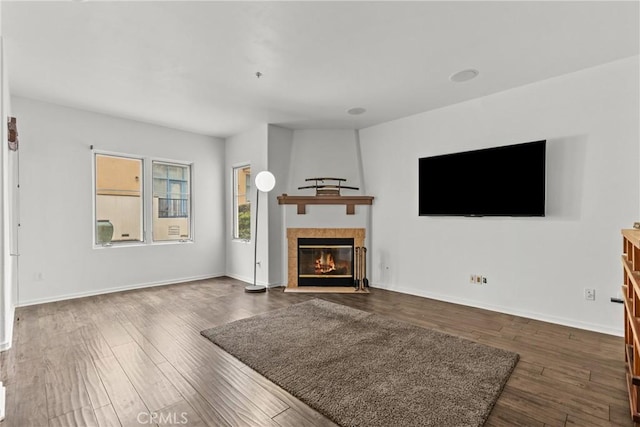 809 Meridian Ave Unit U, South Pasadena, CA 91030 - unfurnished living room with dark wood-style floors, a tile fireplace, and baseboards