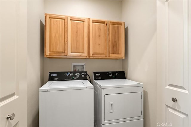 14868 Hickok Ct, Magalia, CA 95954 - laundry room with cabinet space and washer and dryer