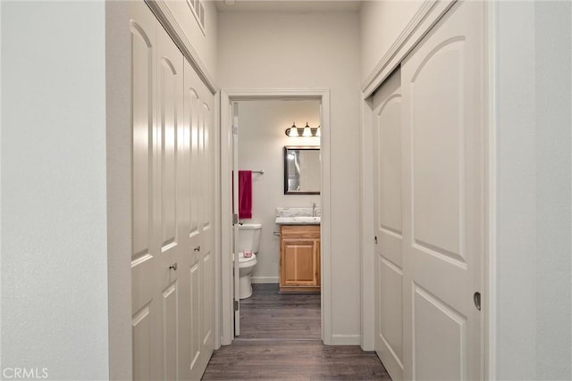 14868 Hickok Ct, Magalia, CA 95954 - hall featuring dark wood-style floors and baseboards