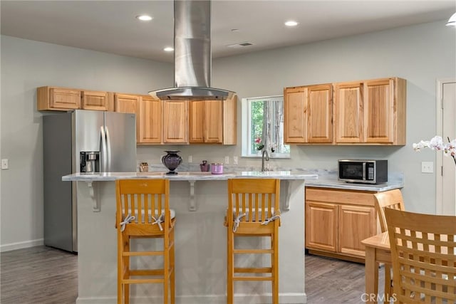 14868 Hickok Ct, Magalia, CA 95954 - kitchen with stainless steel appliances, light countertops, range hood, light wood-style flooring, and recessed lighting