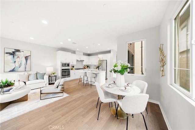 149 Carmine, Irvine, CA 92618 - dining area featuring light wood-style flooring, baseboards, and recessed lighting