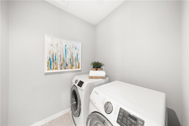 149 Carmine, Irvine, CA 92618 - laundry area with independent washer and dryer, baseboards, and light tile patterned flooring