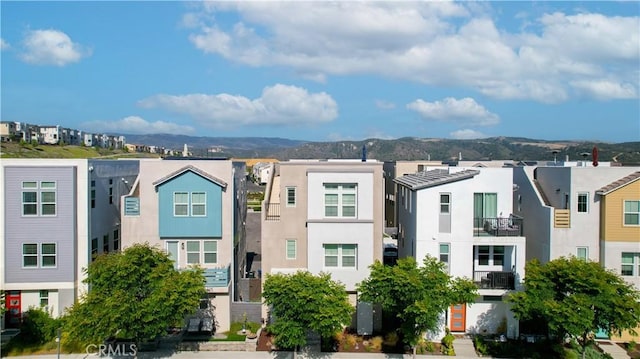 25 Splendor Way, Rancho Mission Viejo, CA 92694 - view of front of house with stucco siding, a mountain view, and a residential view
