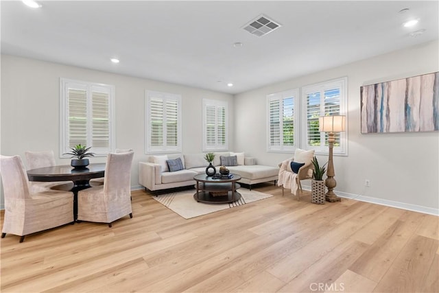 25 Splendor Way, Rancho Mission Viejo, CA 92694 - living room with wood finished floors, recessed lighting, and baseboards