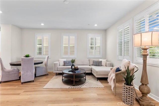 25 Splendor Way, Rancho Mission Viejo, CA 92694 - living room with wood finished floors, recessed lighting, and baseboards