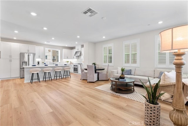 25 Splendor Way, Rancho Mission Viejo, CA 92694 - living room with light wood-style flooring and recessed lighting
