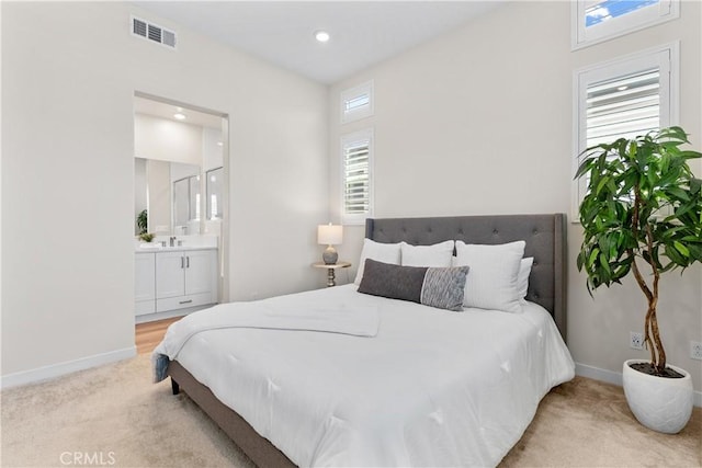 25 Splendor Way, Rancho Mission Viejo, CA 92694 - carpeted bedroom with ensuite bath, baseboards, recessed lighting, and a sink