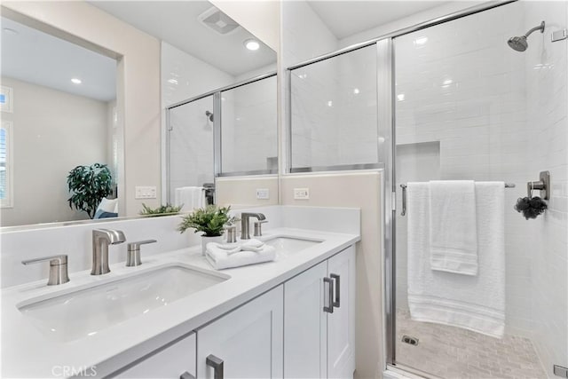 25 Splendor Way, Rancho Mission Viejo, CA 92694 - bathroom featuring a shower stall, double vanity, and recessed lighting