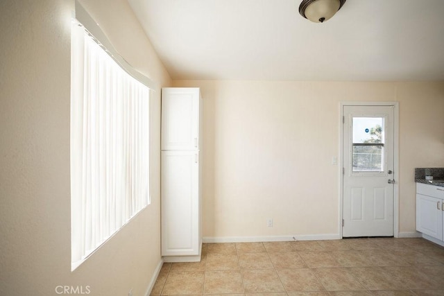 58382 Sunny Sands Dr, Yucca Valley, CA 92284 - spare room with light tile patterned floors and baseboards